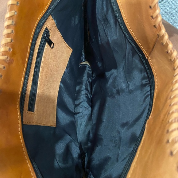 Leather - Picture 3 of 5